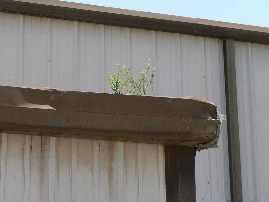 nj-gutters-repaired-on-warehouse
